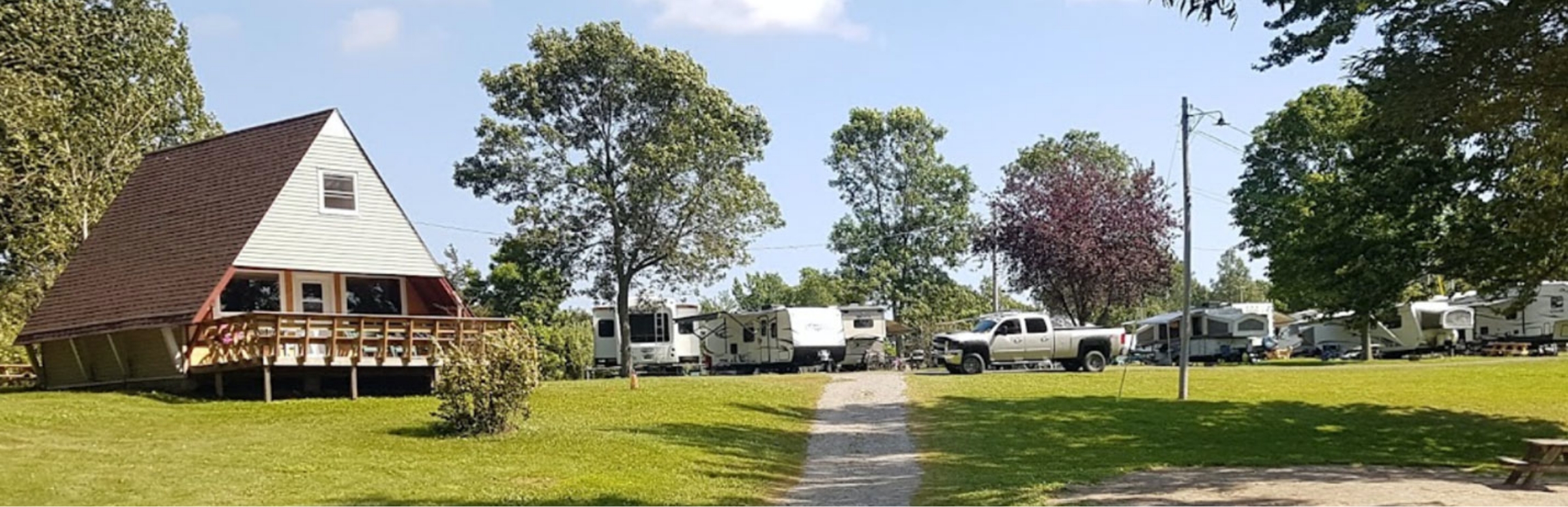 View of Cottage rental and parked RVs